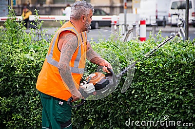 Gardener at work Editorial Stock Photo